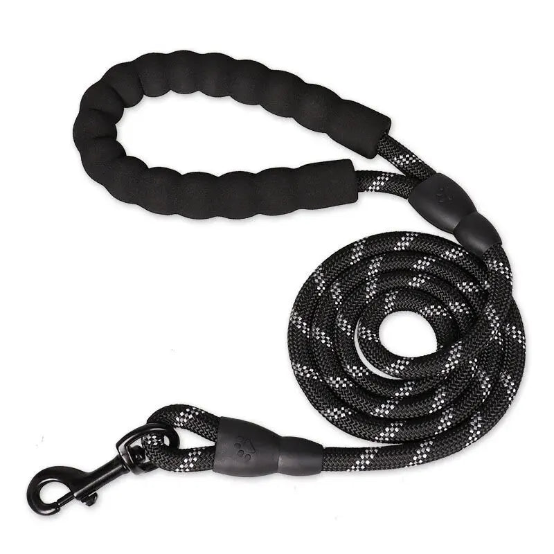 Black reflective rope dog leash coiled with black padded handle and heavy duty metal clasp