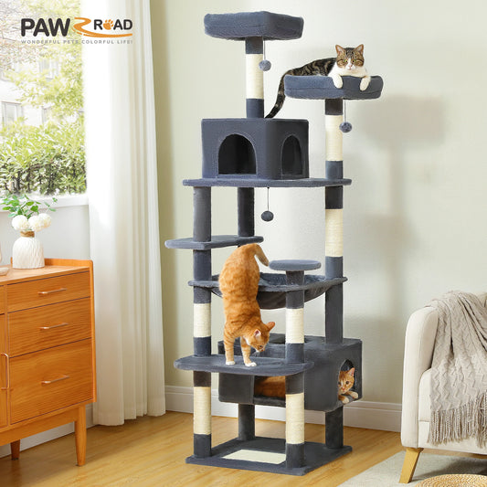 Dark gray multi-level cat tree tower with two condos, padded perches and sisal posts in a living room with three cats