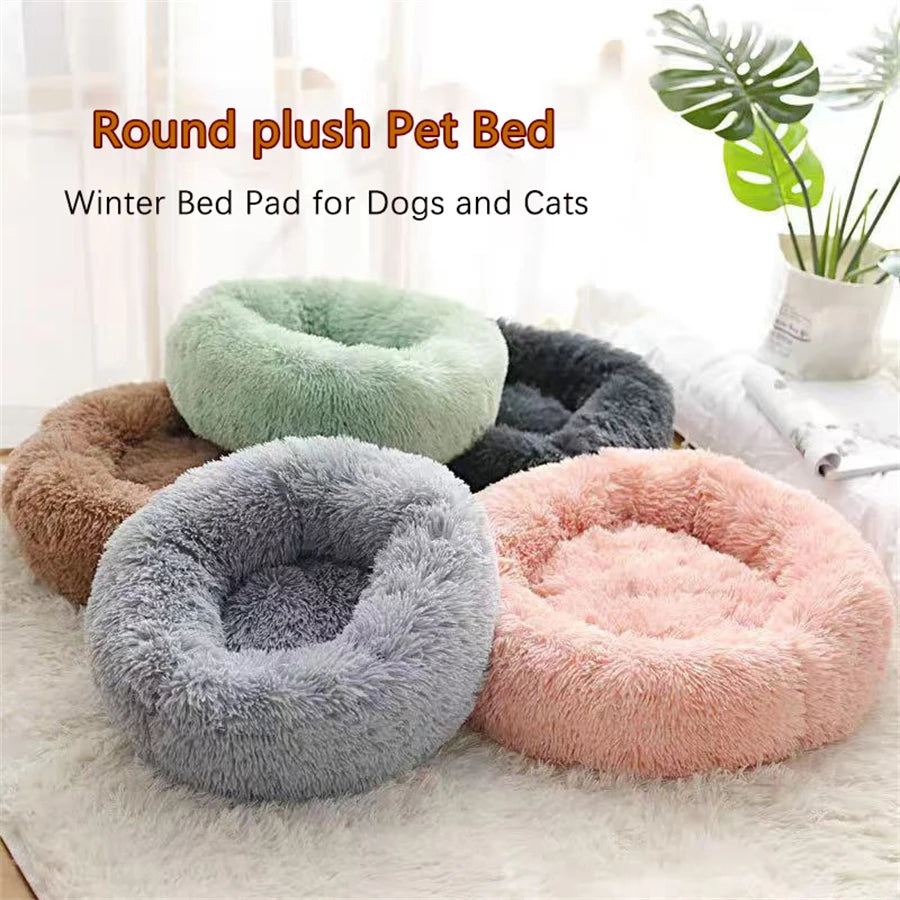 Round plush donut pet beds shown in green, khaki, gray and pink