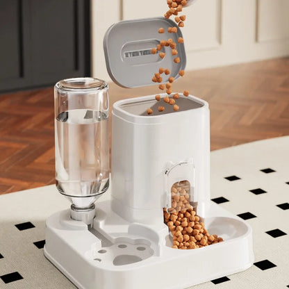 Refilling the automatic pet feeder hopper with dry kibble