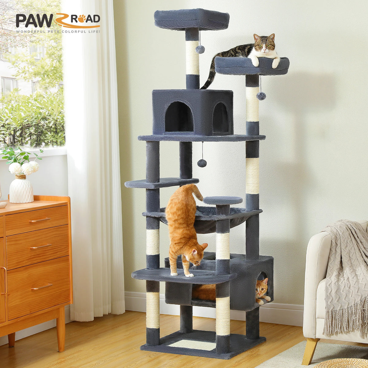 Dark gray multi-level cat tree tower with two condos, padded perches and sisal posts in a living room with three cats