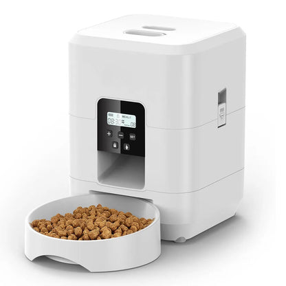 White automatic pet feeder with LCD button control panel and a bowl of dry cat food