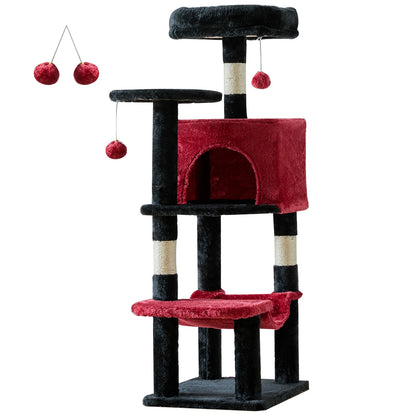 Red cat tree on a white background with black plush posts, red condo, red hammock and dangling pom-pom balls