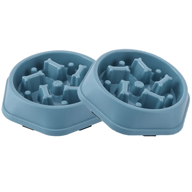 Two-piece set of blue maze slow feeder dog bowls on a white background