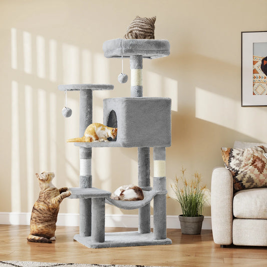 Light grey 43.6-inch cat tree in a sunlit living room with three cats using the top perch, condo and lower platform