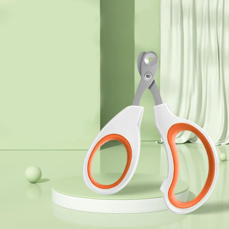 Orange-handled cat nail clippers with a stainless steel round-hole blade