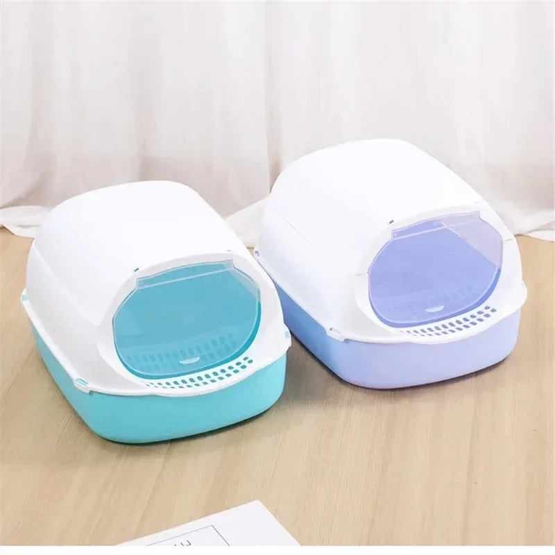 Blue and purple hooded cat litter boxes with removable top covers and flap doors