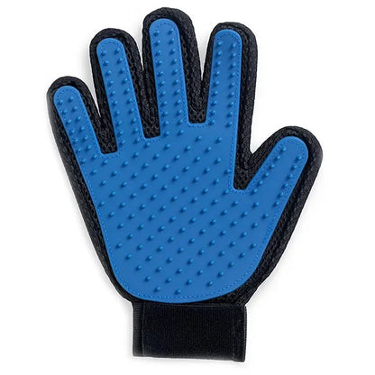 Blue silicone pet grooming glove laid flat on a white background showing the raised grooming nubs