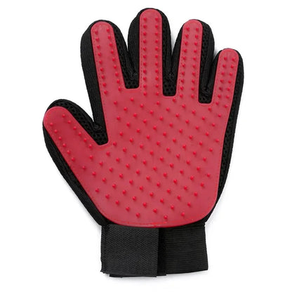 Red silicone pet grooming glove on a white background, alternate view