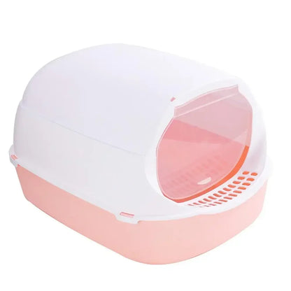 Pink covered cat litter box with hood and swinging door on a white background